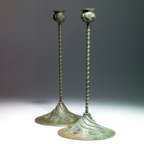 Appraisal: ARTS CRAFTS Pair of bronze tall candlesticks with coiled rope