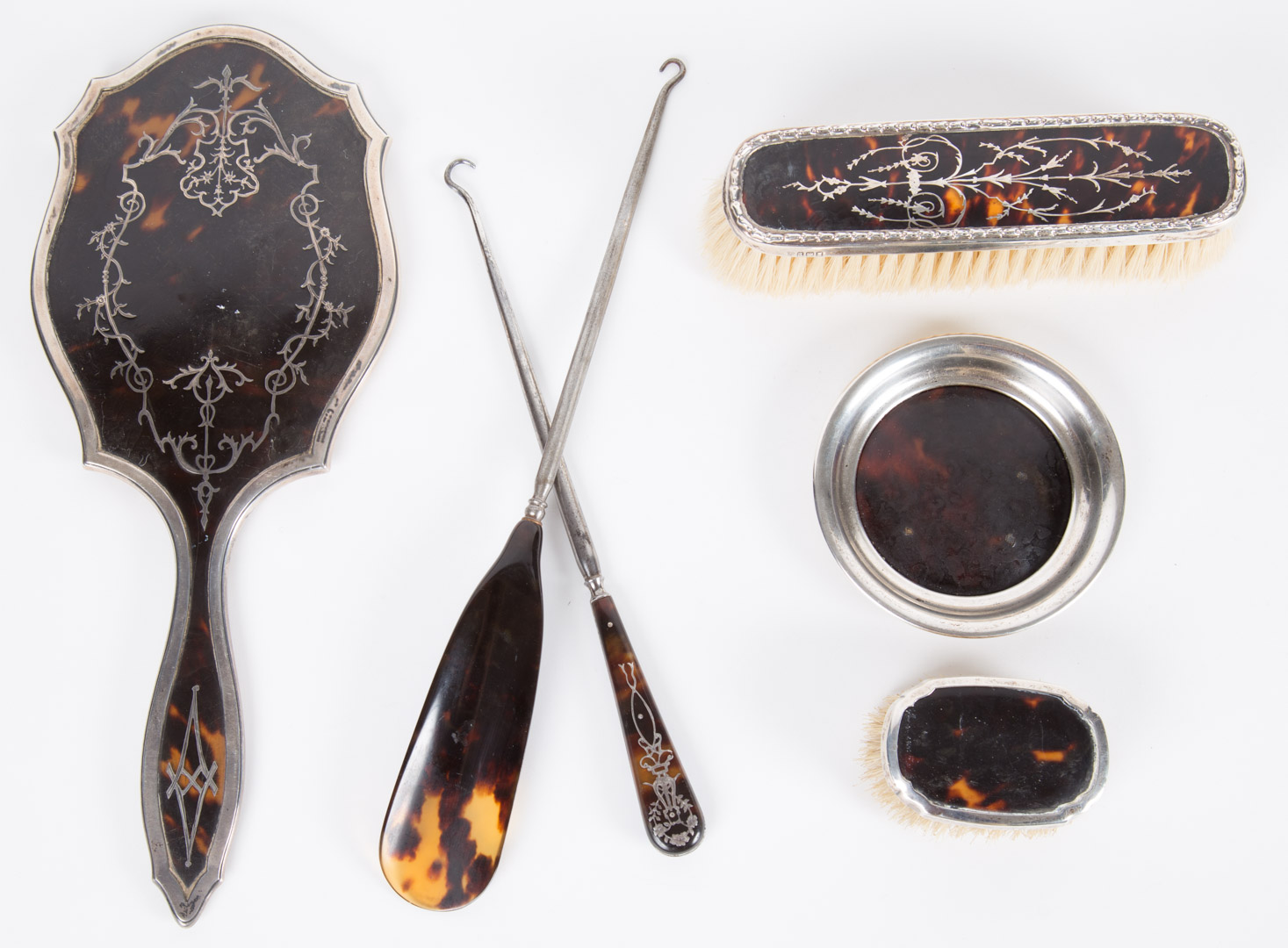 Appraisal: first quarter- th century includes silver and tortoiseshell hand mirror