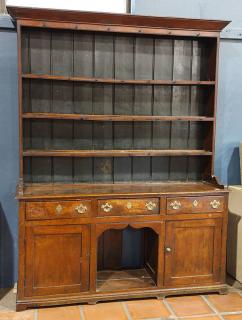 Appraisal: Walnut Welsh cupboard Walnut Welsh cupboard second quarter th century