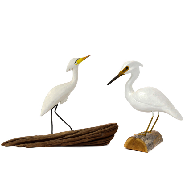 Appraisal: Pair of hand carved and painted wood shore birds Smaller