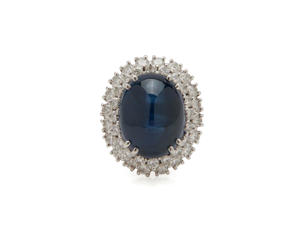 Appraisal: Platinum Sapphire and Diamond Ring centering a cabochon sapphire measuring