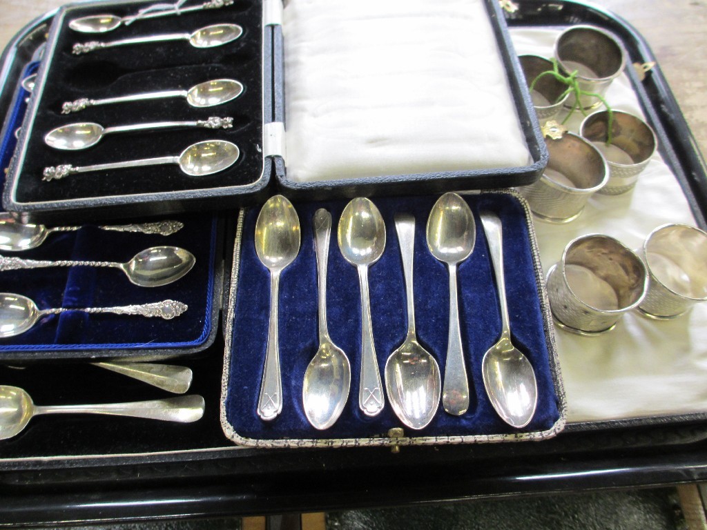 Appraisal: A lot comprising two sets of cased silver spoons two