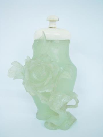 Appraisal: A carved Chinese jade vase with rose decoration high plus