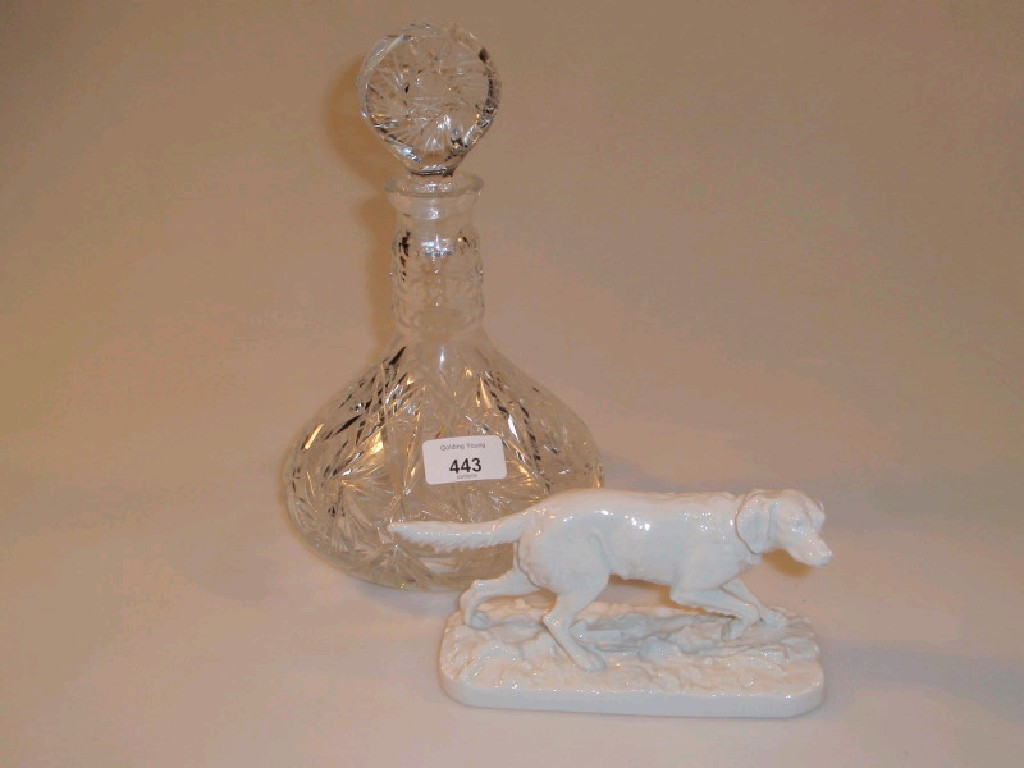 Appraisal: A German white porcelain figure of a setter on naturalistic