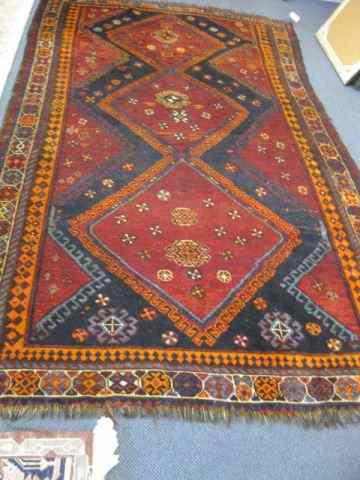 Appraisal: Bakhtiari Handmade Rug triple medallion deep earthtones ' '' x