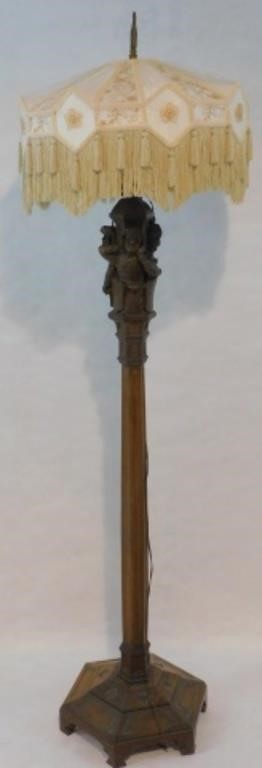 Appraisal: CARVED WOODEN FLOOR LAMP POSSIBLY ENGLISH ARTS Crafts ca Carved