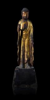 Appraisal: A Gilt Lacquered Wood Figure of Standing Buddha carved wood