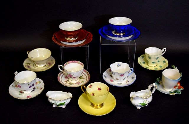 Appraisal: Grouping of Cups Saucers Sugar Creamer Hutschenreuther porcelain silver overlay