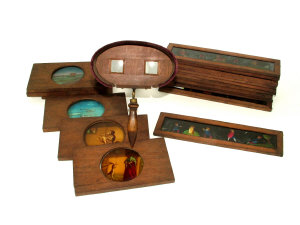 Appraisal: An Edwardian mahogany stereo card viewer and a collection of