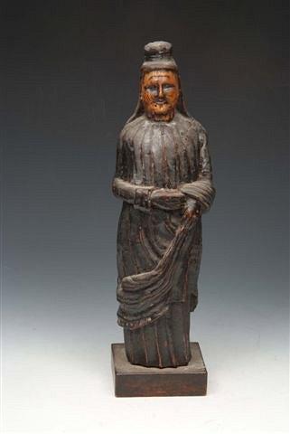 Appraisal: A NORTH EUROPEAN CARVED PROBABLY LIMEWOOD MODEL OF A SAINT