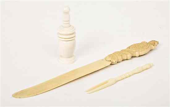 Appraisal: A European Carved Ivory Letter Opener having a scrolled handle