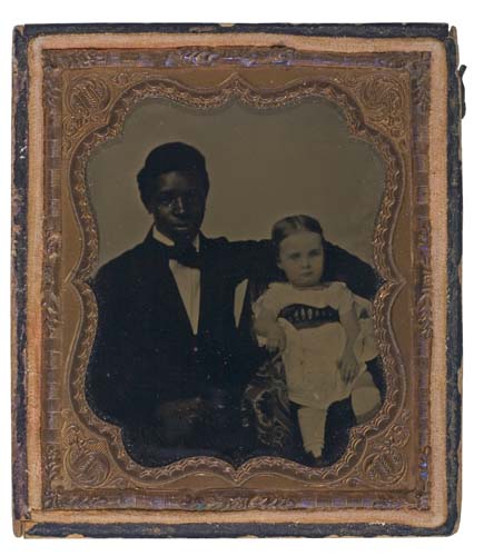 Appraisal: PHOTOGRAPHY Well-dressed young black man with a white child Sixth