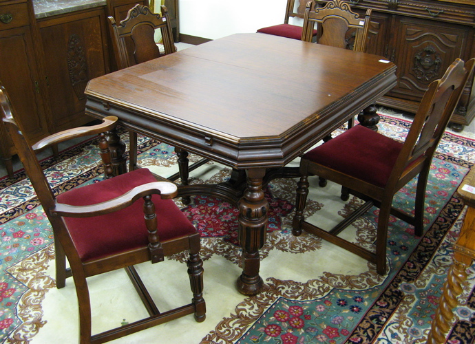 Appraisal: WALNUT DINING TABLE AND CHAIR SET American c 's the