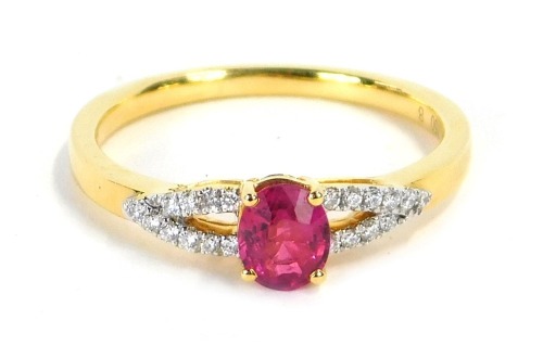 Appraisal: A ruby and diamond dress ring with oval cut ruby