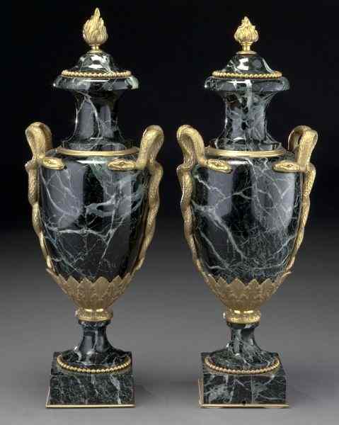 Appraisal: Pr French green marble lidded cassolettes surmounted by a flame