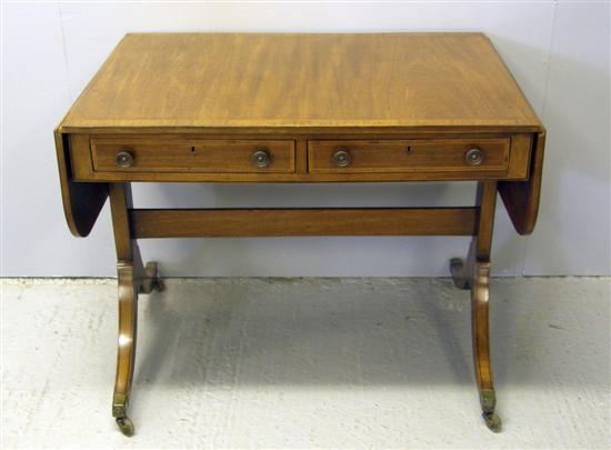 Appraisal: George III mahogany boxwood and ebony strung cross-banded sofa table