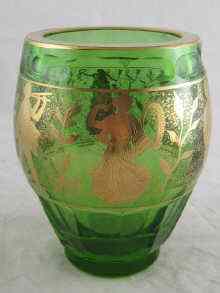 Appraisal: A continental heavy green glass vase facet cut and with