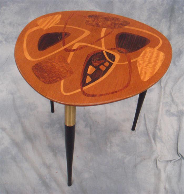 Appraisal: Inlaid Swedish art moderne occasional table legs rounded triangle across