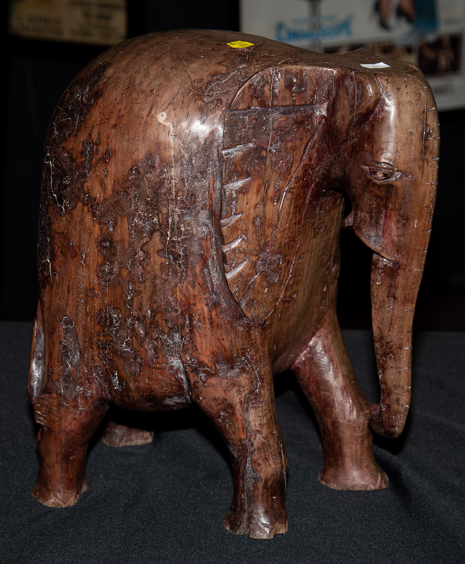 Appraisal: AFRICAN CARVED LIGNUM VITAE ELEPHANT Lignum Vitae is one of