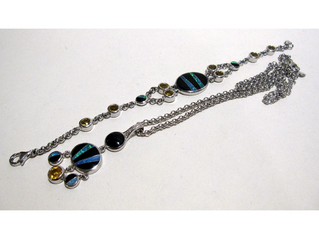 Appraisal: Silver pendant set with onyx and paste stones with matching