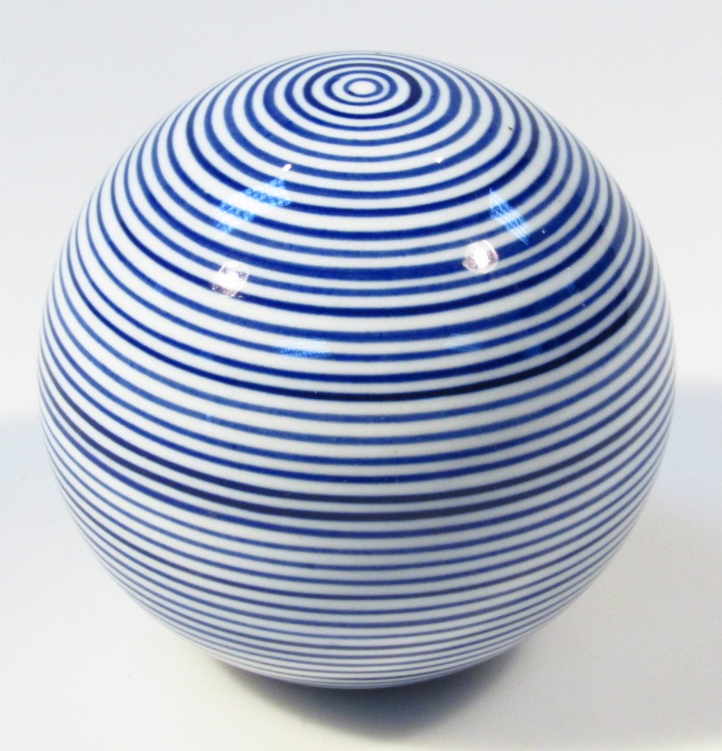 Appraisal: A thC blue and white porcelain carpet bowl style paperweight