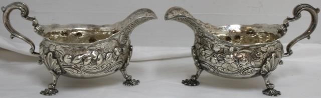 Appraisal: TWO WILLIAM GALLOWAY - LONDON STERLINGSILVER SAUCE BOATS ROCOCO REPOUSSE