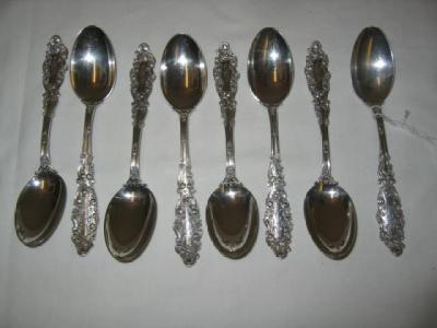 Appraisal: A SET OF EIGHT VICTORIAN TEASPOONS the shaped hafts cast