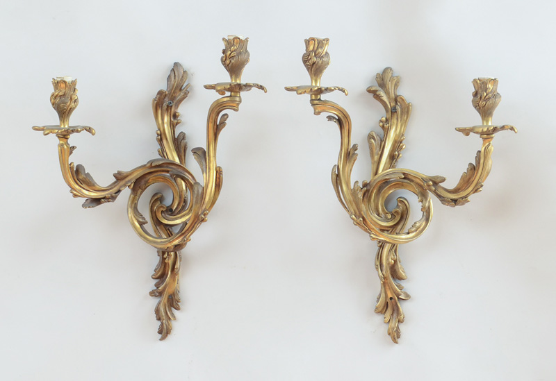 Appraisal: PAIR OF LOUIS XV STYLE GILT-BRONZE TWO-LIGHT WALL SCONCES Each