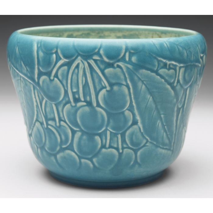 Appraisal: Rookwood jardiniere cherry design covered in a blue matte glaze