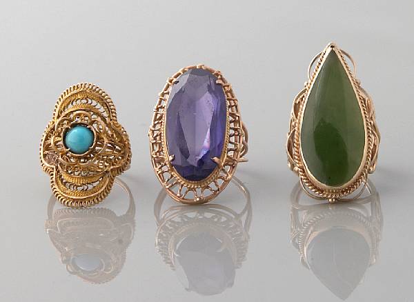 Appraisal: A collection of stone and gold jewelry four rings and