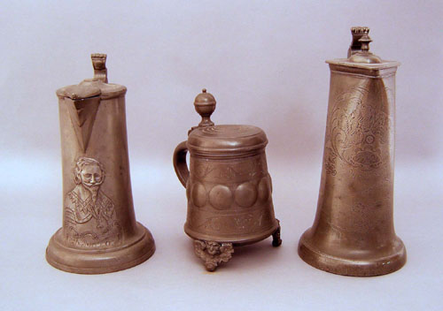 Appraisal: Two German pewter flagons h h together with a tankard