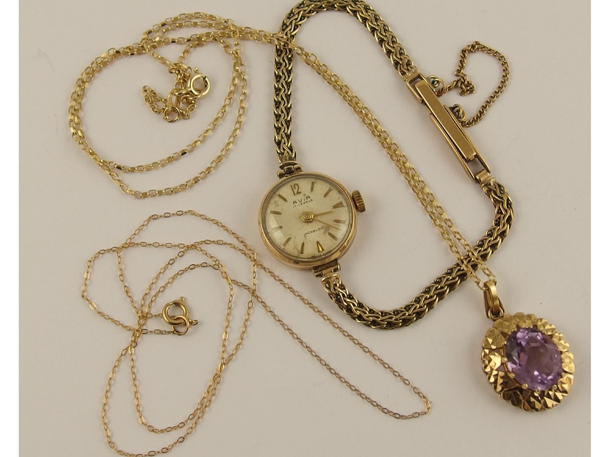 Appraisal: A ct ladies watch and strap an amethyst ct pendant