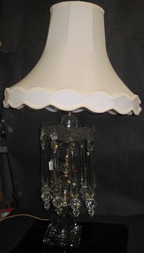 Appraisal: A CRYSTAL TABLE LAMP with white custom silk shade The