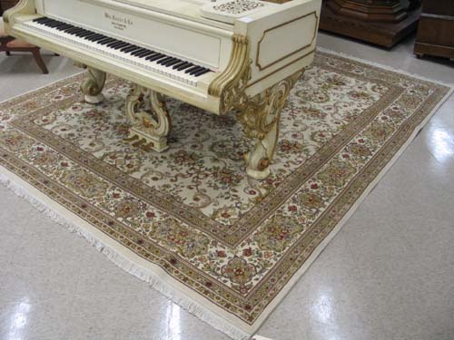 Appraisal: HAND KNOTTED ORIENTAL CARPET overall floral decoration on ivory ground