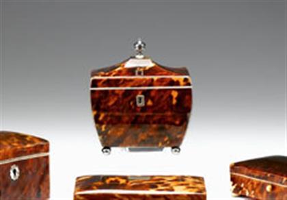 Appraisal: Tortoiseshell tea caddy th century Of casket form with stringing