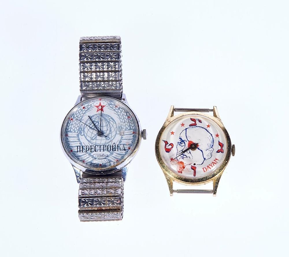 Appraisal: Two novelty watches One depicting Moshe Dayan one Soviet Perestroika