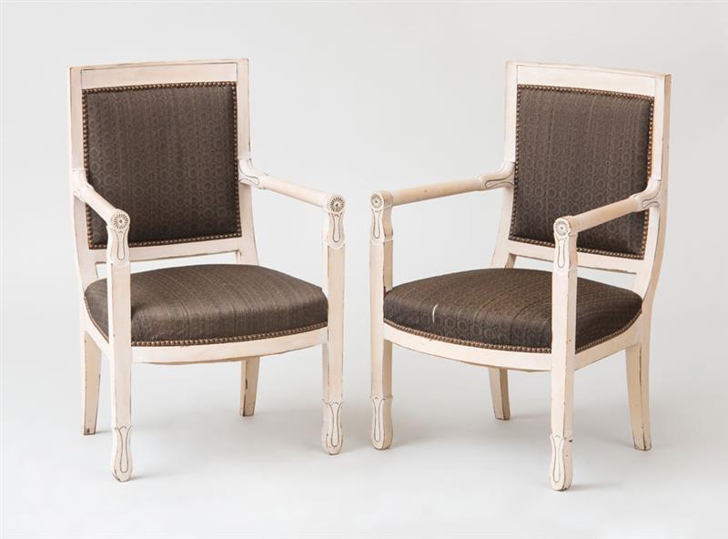 Appraisal: PAIR OF DIRECTOIRE STYLE PAINTED FAUTEUILS LA REINE Upholstered in