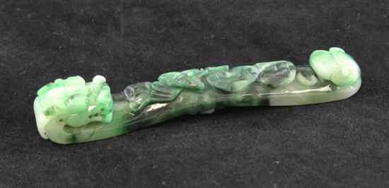 Appraisal: A Chinese jadeite belt hook possibly th century carved in