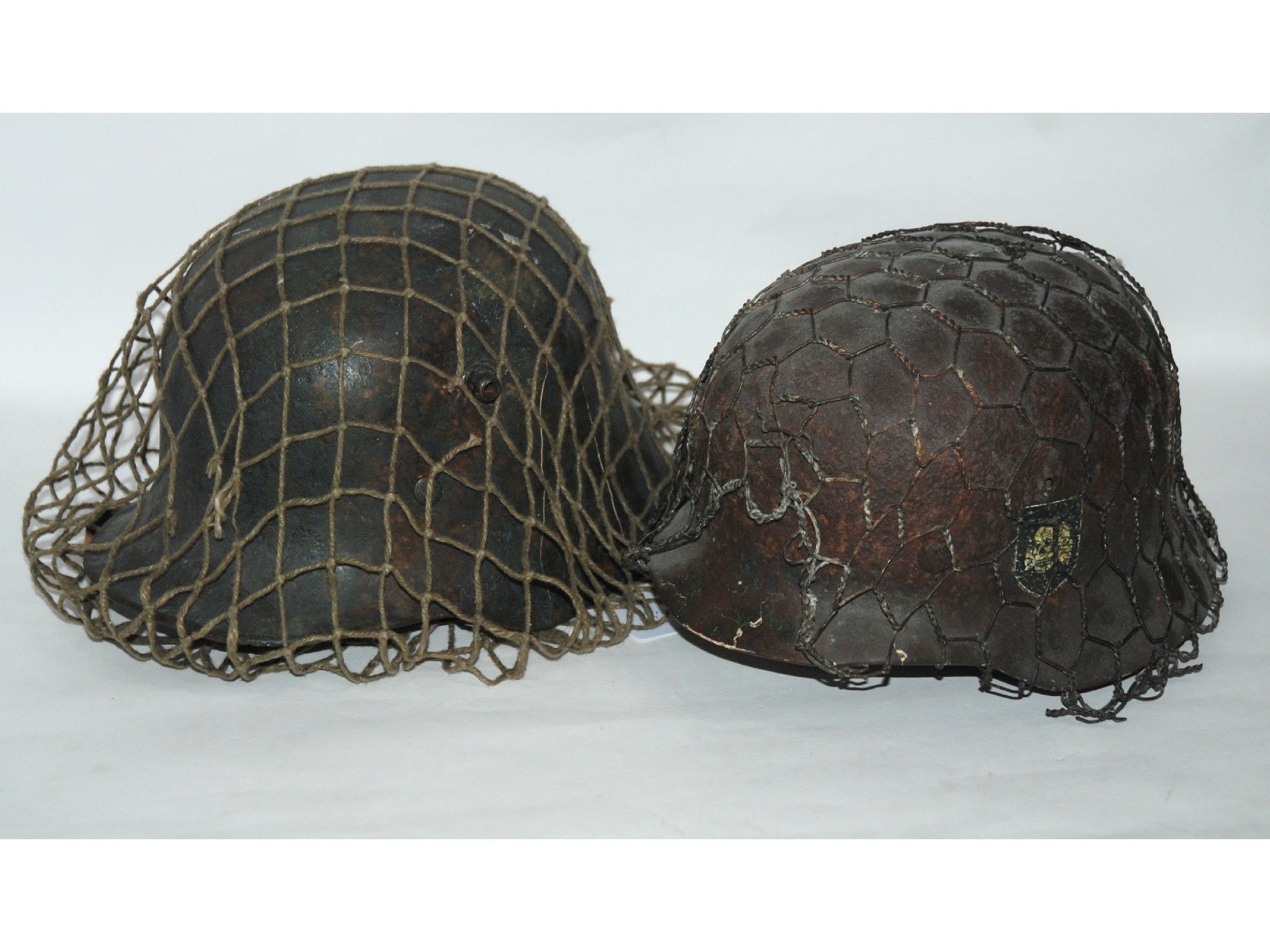 Appraisal: A German military helmet and a replica example