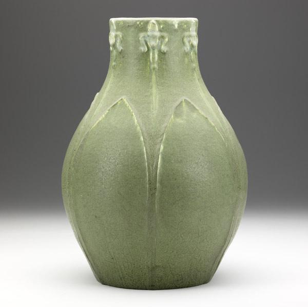 Appraisal: GRUEBYLarge matte green vase with leaves and blue iris blossomsCircular