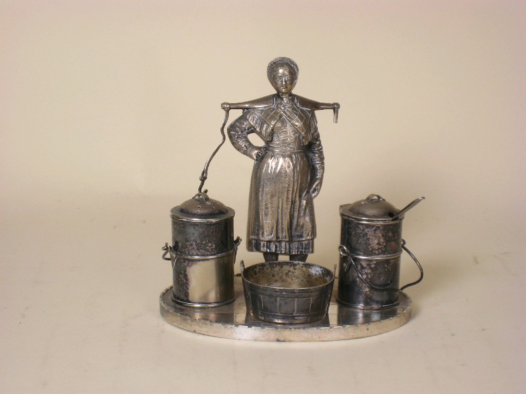 Appraisal: A plated Condiment Stand in the form of a milkmaid