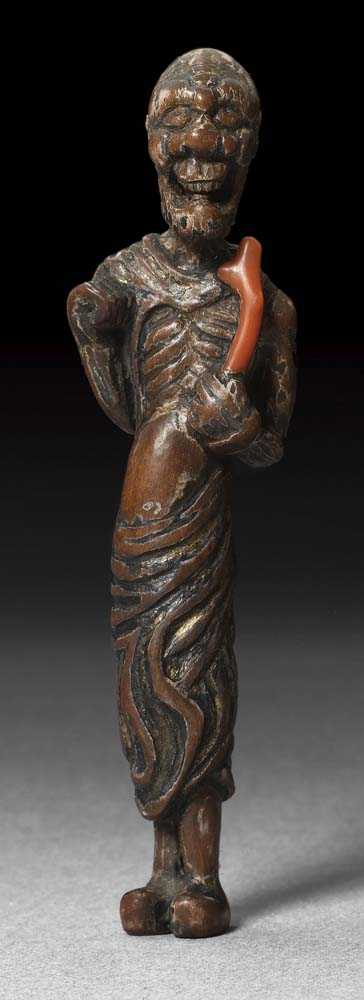 Appraisal: NETSUKE OF A SOUTH SEA ISLANDER Japan th th century