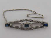 Appraisal: An Art Deco diamond and synthetic sapphire bar brooch the