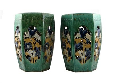 Appraisal: A pair of Chinese hexagonal garden seats with reticulated sides