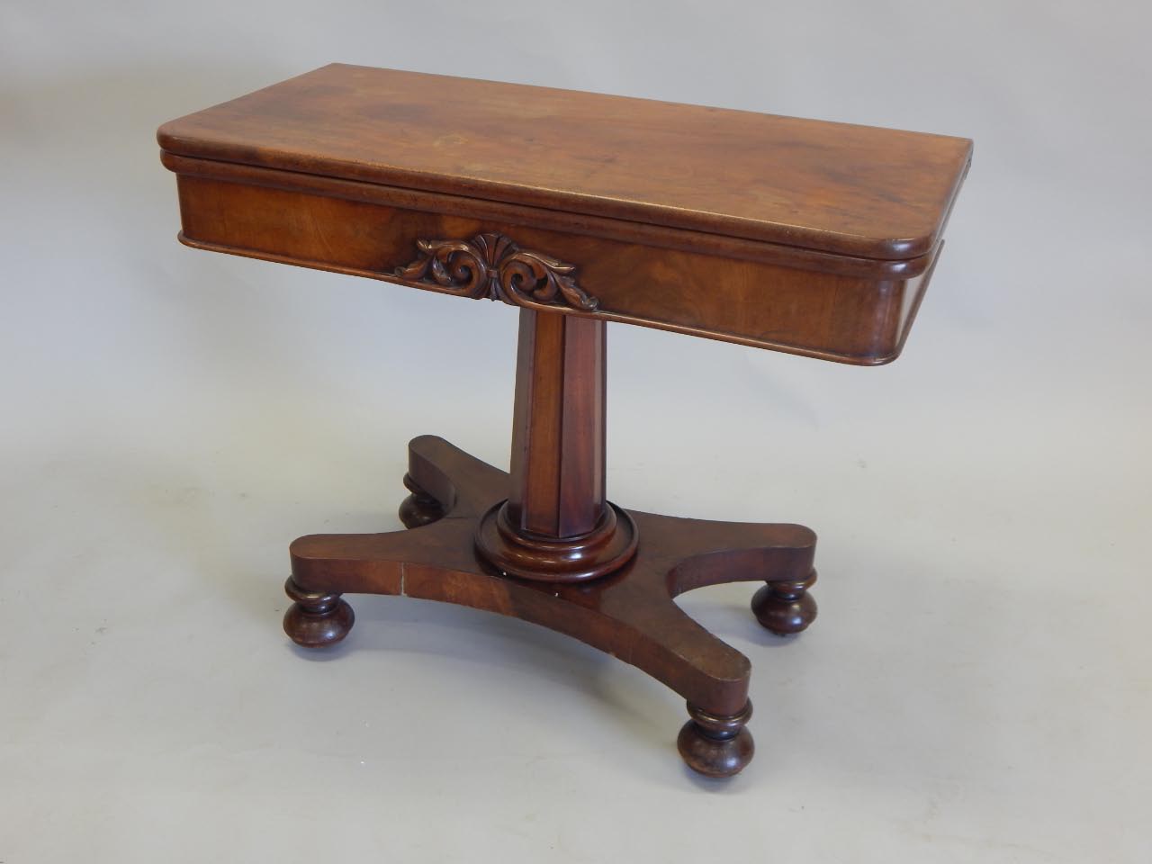 Appraisal: An early Victorian mahogany tea table the rectangular top with