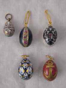 Appraisal: Five Russian enamel egg pendants largest approx cm