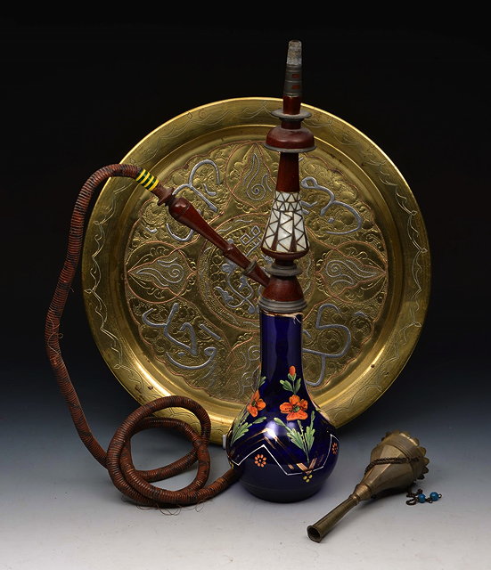 Appraisal: A MIDDLE EASTERN BLUE GLASS AND WOODEN HOOKAH with pipe