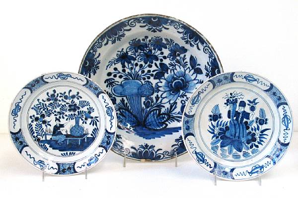 Appraisal: Three Dutch Delft blue and white plates th th century