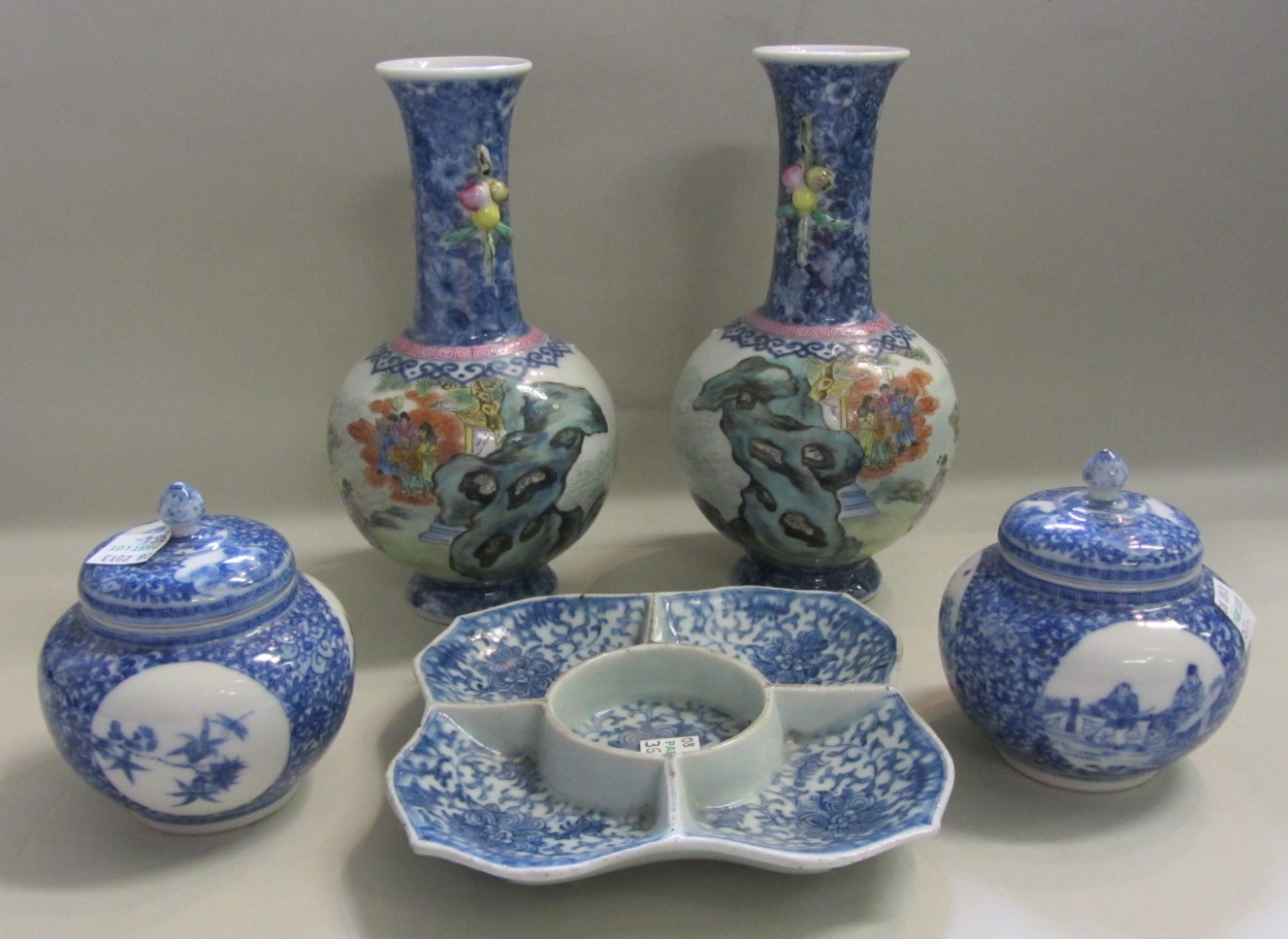 Appraisal: A pair of Chinese famille rose bottle vases th century