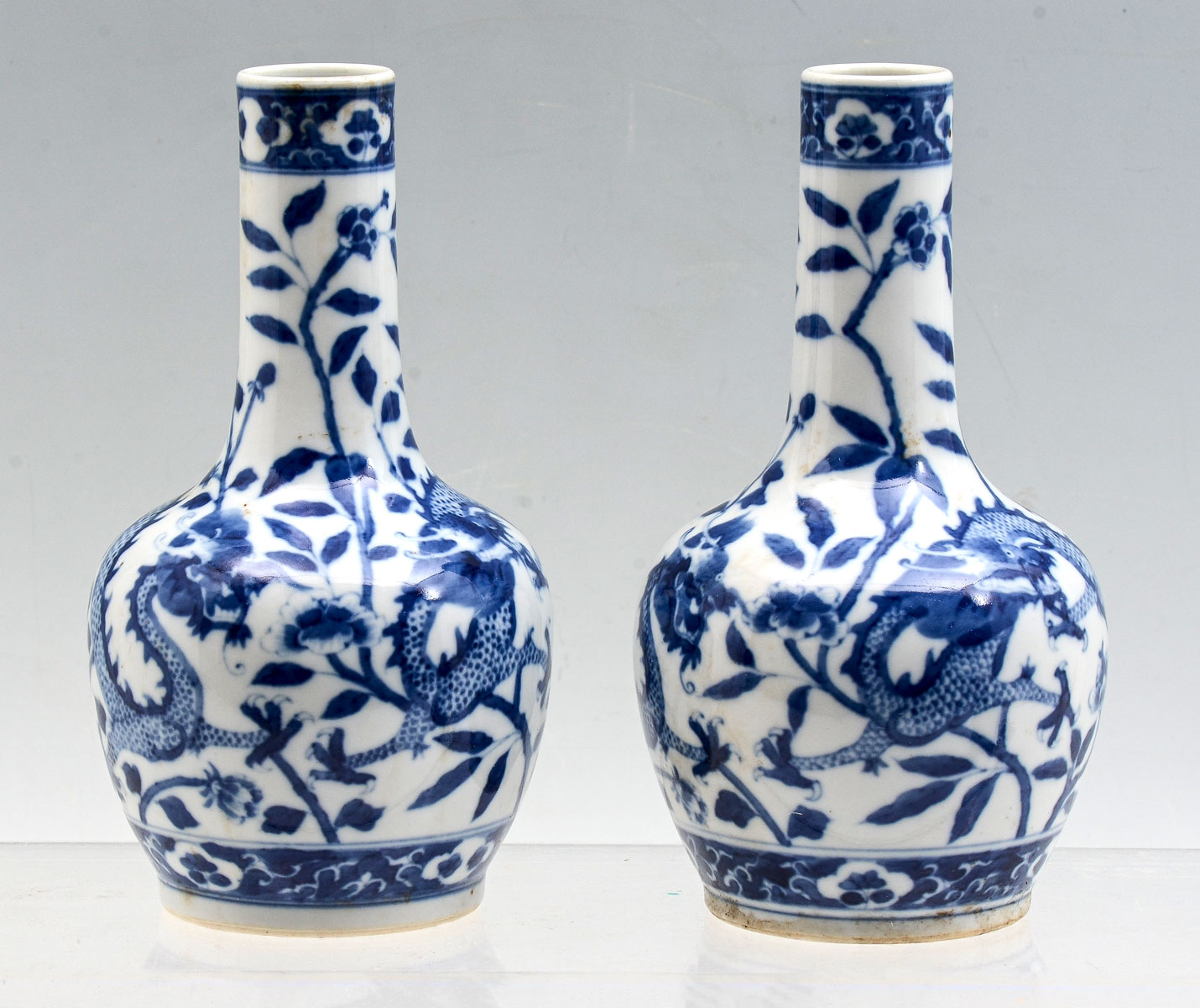 Appraisal: PAIR OF CHINESE BLUE WHITE DRAGON VASES Pair of Chinese